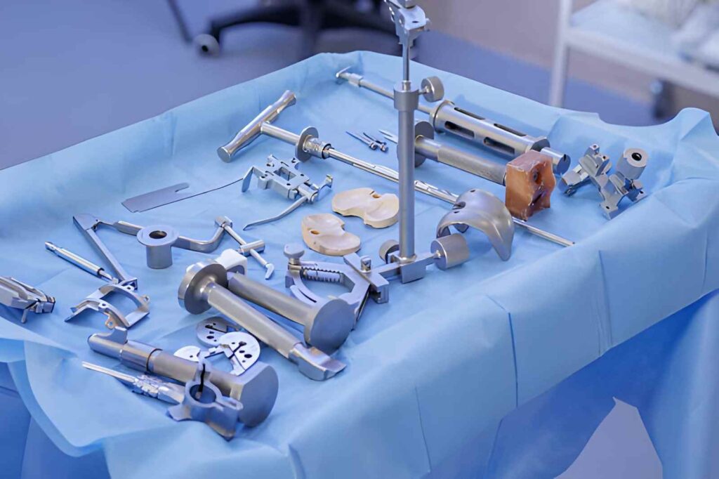 Knee arthroplasty instruments and prosthesis components