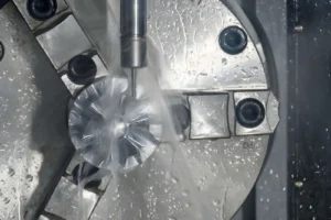 5-axis CNC milling machine cutting the turbocharger part with a solid ball end mill tool.