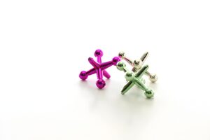 Anodized colored jacks toys