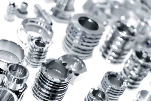 Mass-produced stainless steel threaded components