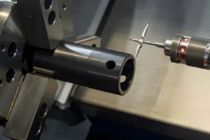 Close-up scene of the modular touch probe checking the tube parts on a CNC lathe machine