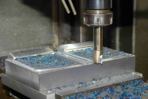 Metal chips generated during a heavy-duty CNC milling roughing process